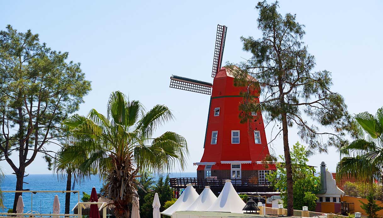 The beach at luxury hotel with Dutch windmill, Antalya, Turkey